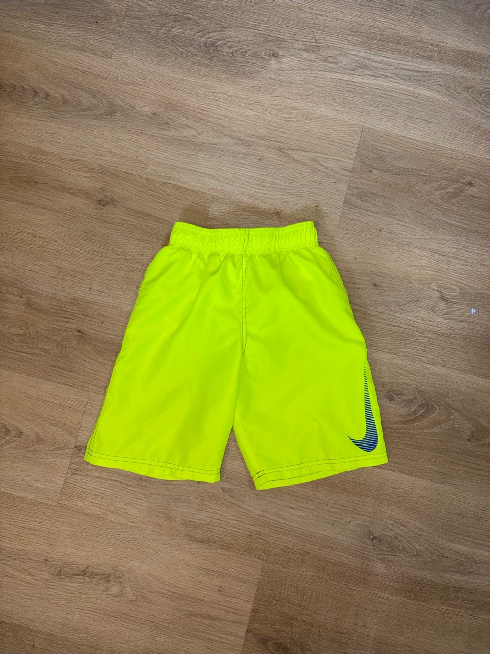 Nike Yellow swim trunks